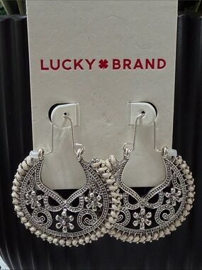 Lucky Brand silver-tone boho drop hoop earrings featuring an intricate openwork